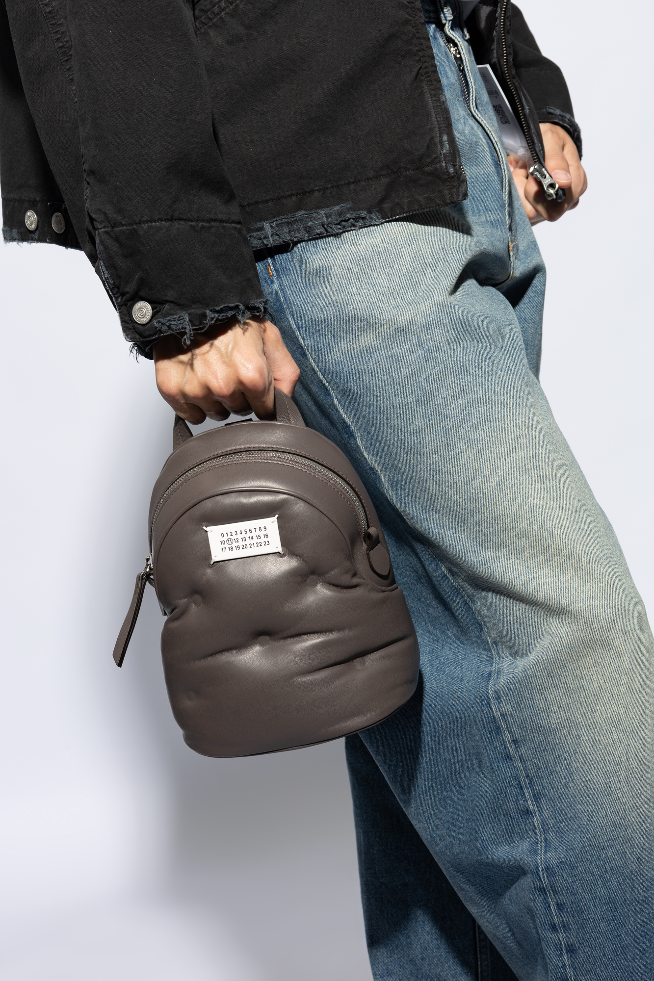 Brown Leather backpack with the option to be worn as a bag Maison Margiela Vitkac Italy